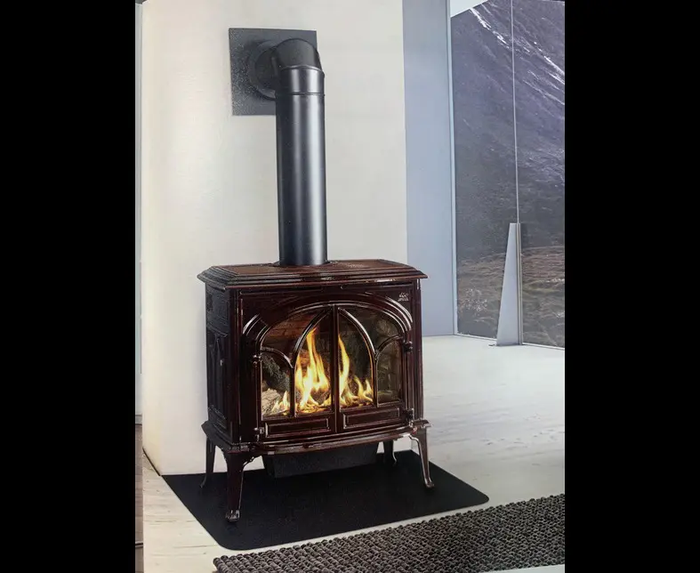 Vintage cast-iron wood-burning stove with flames
