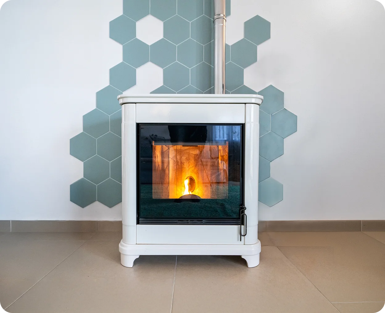 Modern fireplace with hexagonal tile backdrop